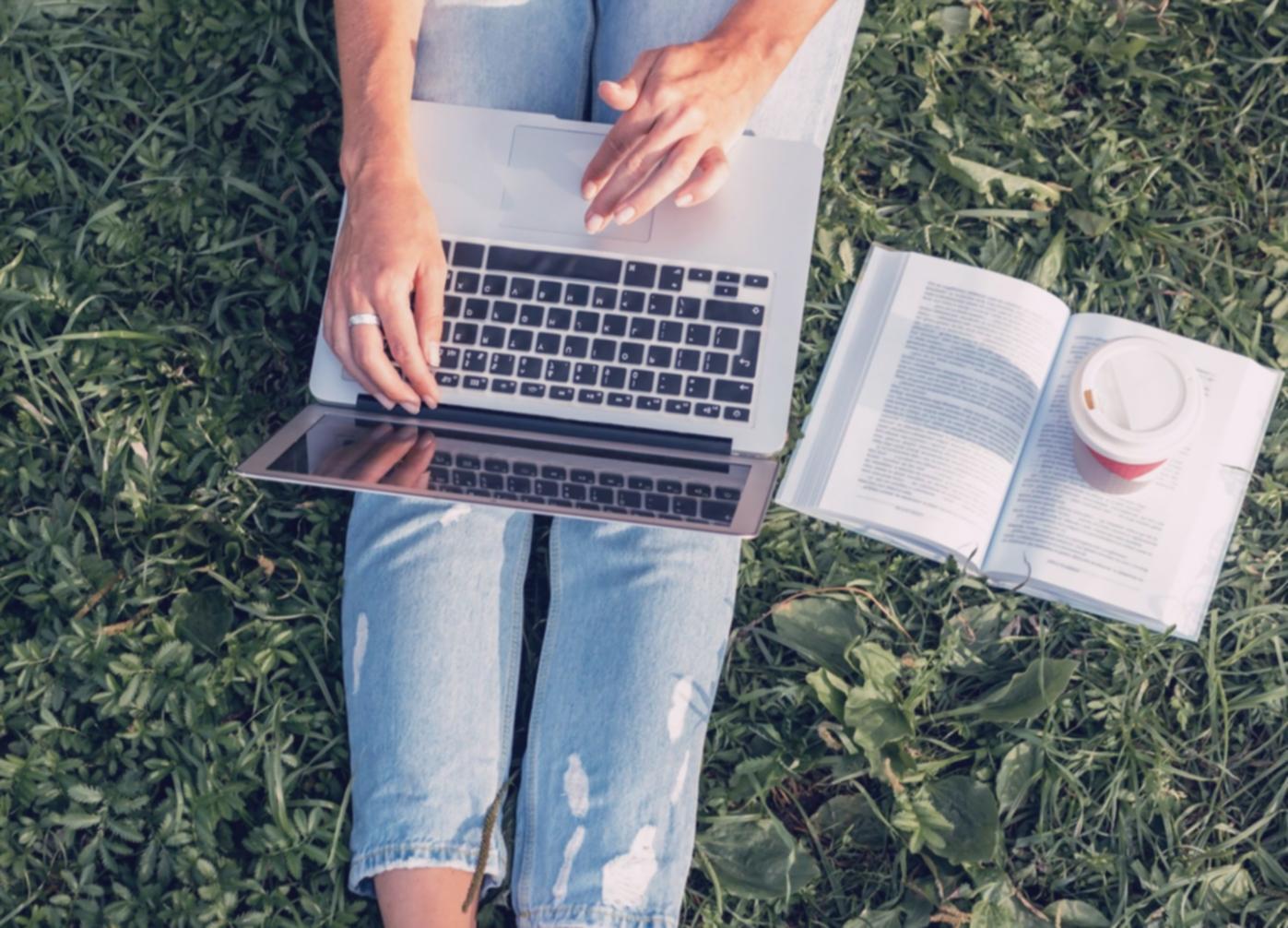 Learner working through financial technology course material at home